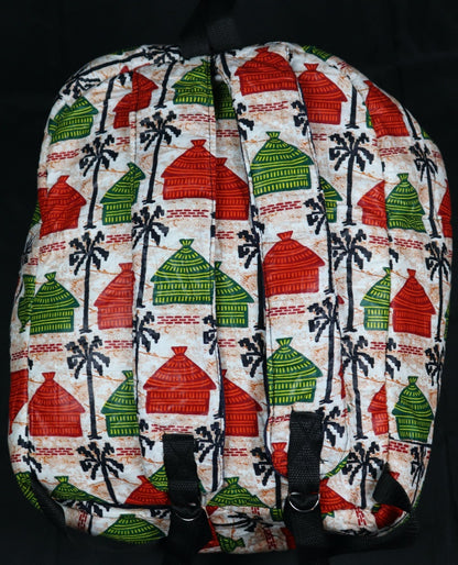 Handcrafted fabric backpack featuring cultural symbols. Made in Ghana.