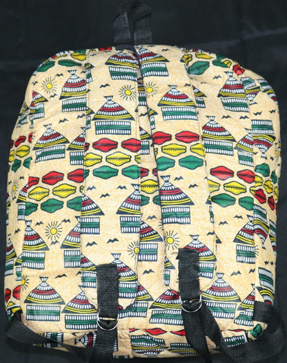 Handcrafted fabric backpack featuring cultural symbols. Made in Ghana.